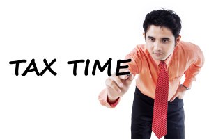 bigstock Tax Consultant Writes Tax Time 115441898 300x200 small